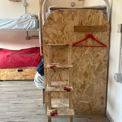 the steps to the upper beds in the dorm